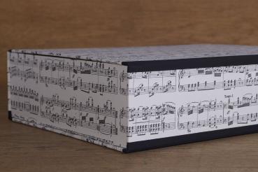 Music box with black and white music motif