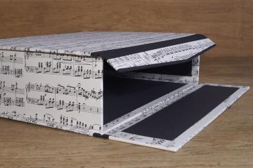 Music box for exercise books with a foldable front