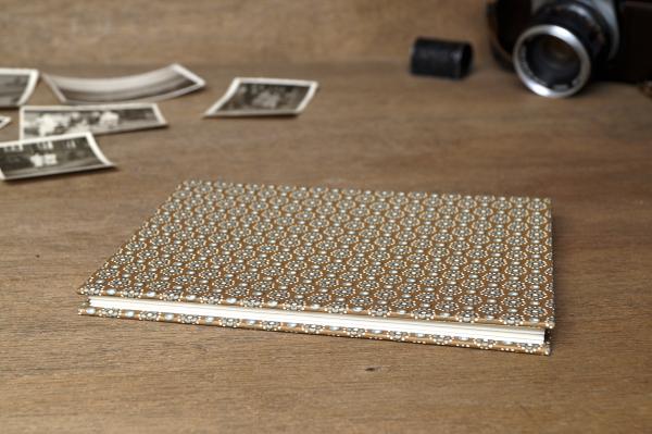 Mini photo book light brown with small flowers and light colored pages
